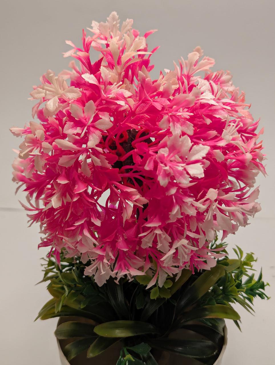 pink artificial floral ball pot indoor